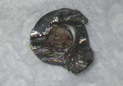 Cutting of the apex of the implant, seen from above